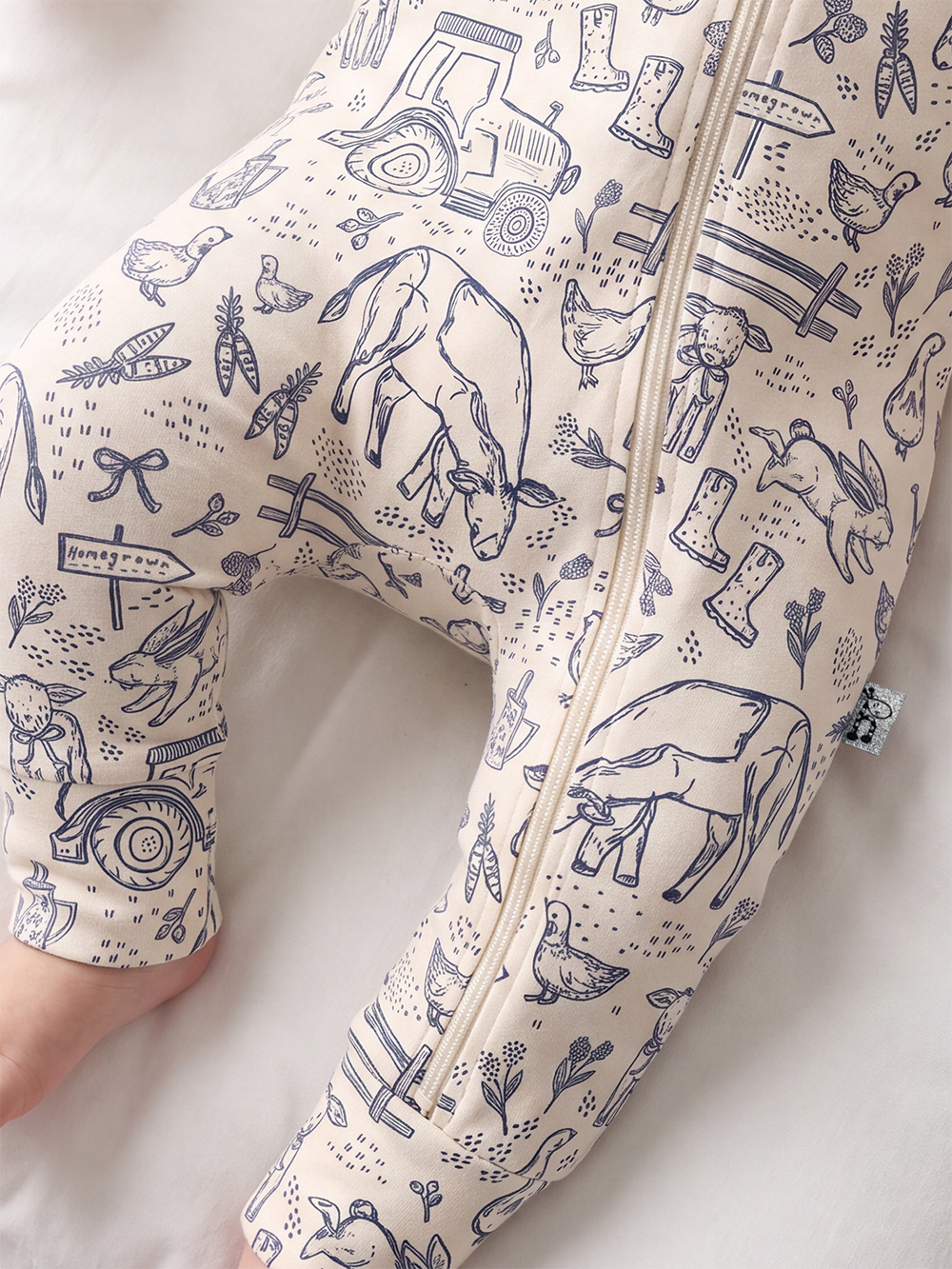 26SMO Meadows Allover Print Newborn Onesie Model 2